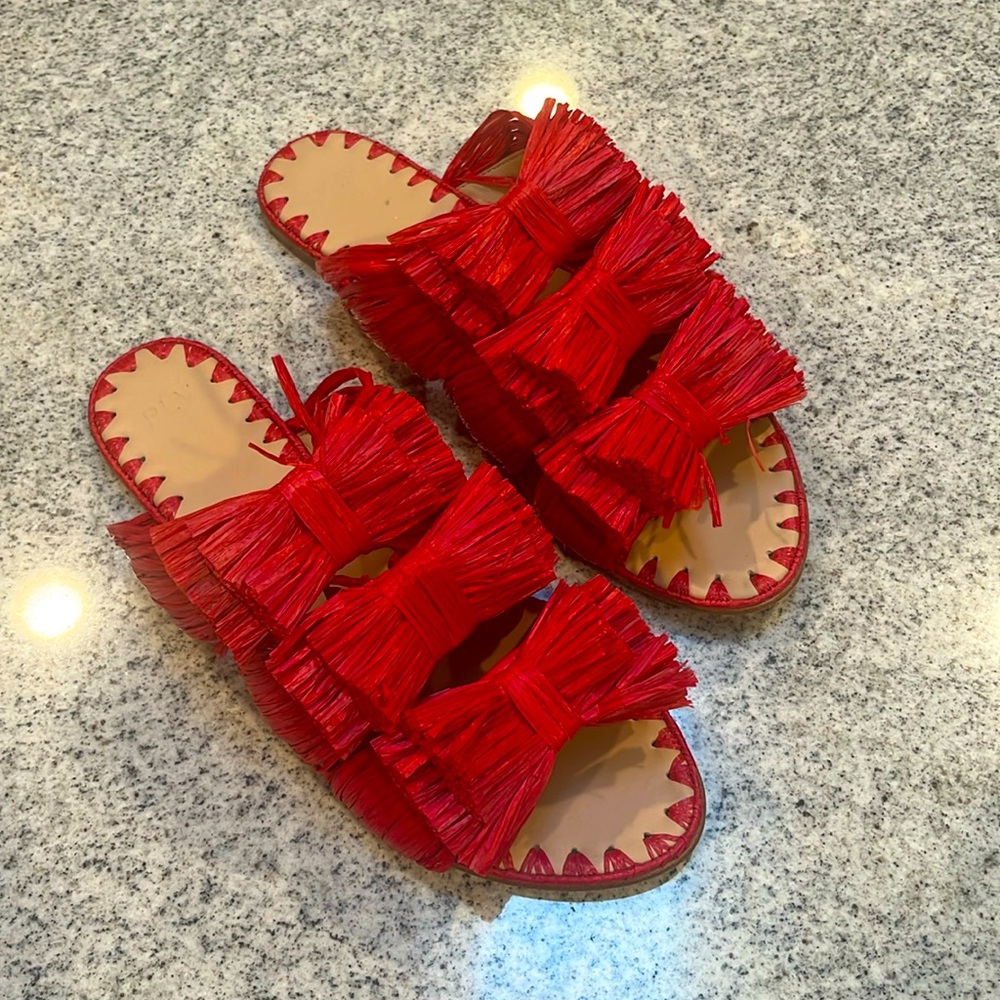 Unique, Raffia slides in like new condition. Worn once. Great for vacations!